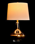 Design table lamp in gold and glass